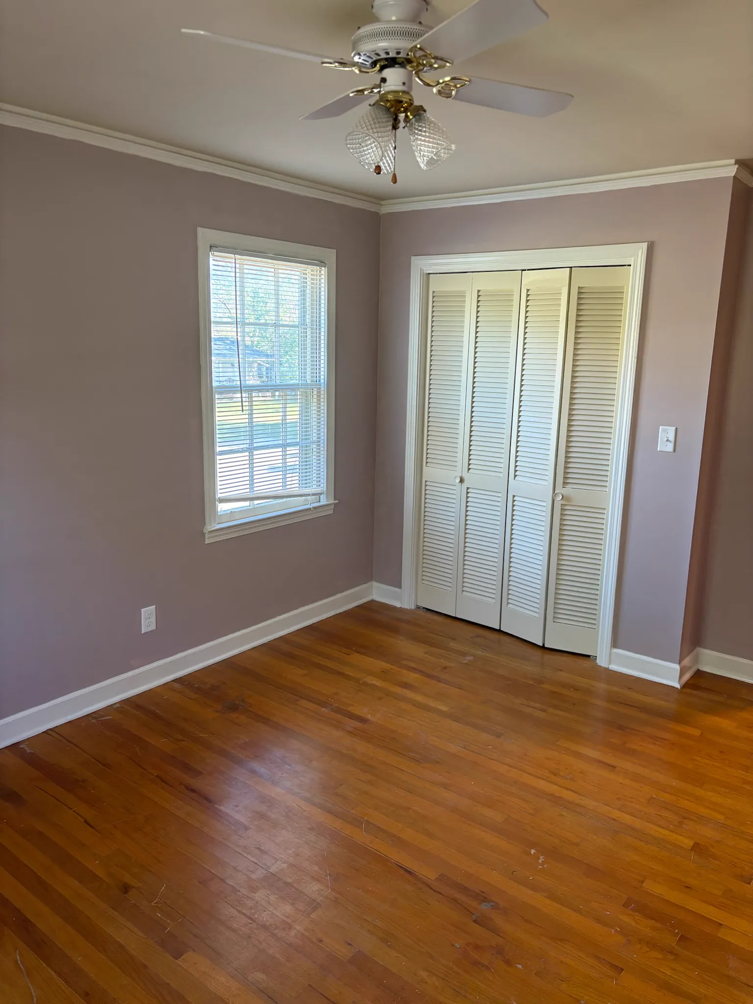 Taupe bedroom with white trim paint project